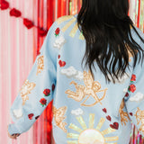 Light Blue Cupid In The Sky Sweatshirt | Queen Of Sparkles