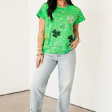 Green Groovy Shamrock Tee | Queen Of Sparkles